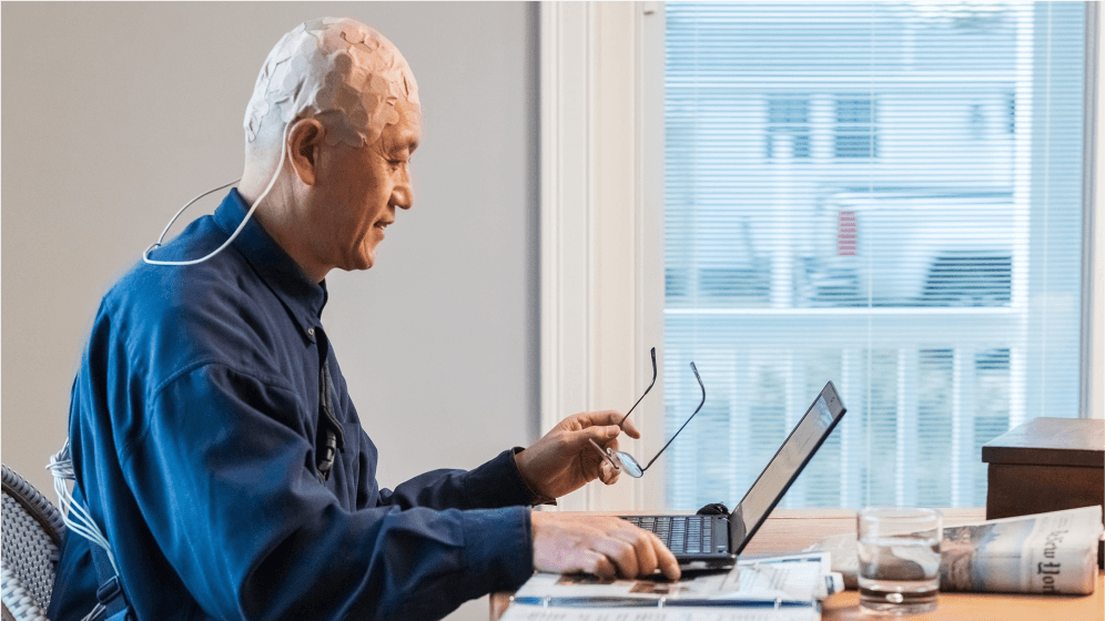 Contact Us hero banner with medical and technology abstract shapes in blue and orange tones